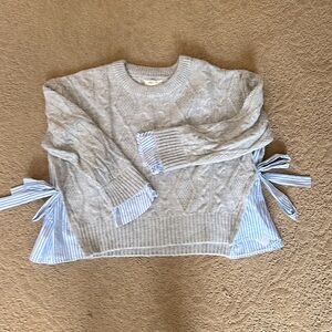 Anthropology grey sweater with blue and white stripped cuffs and sides. Medium